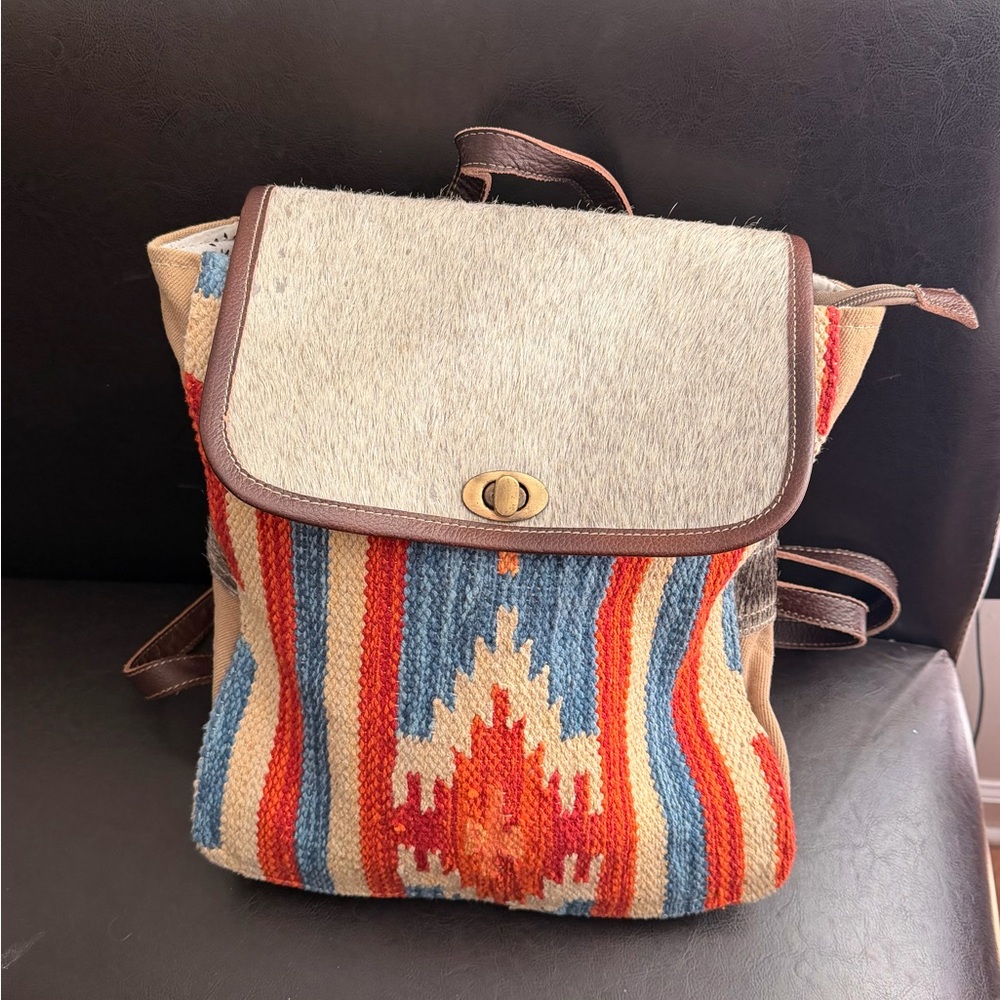 Myra Bag Vibrant Red and Blue Patterned Backpack with cowhide.